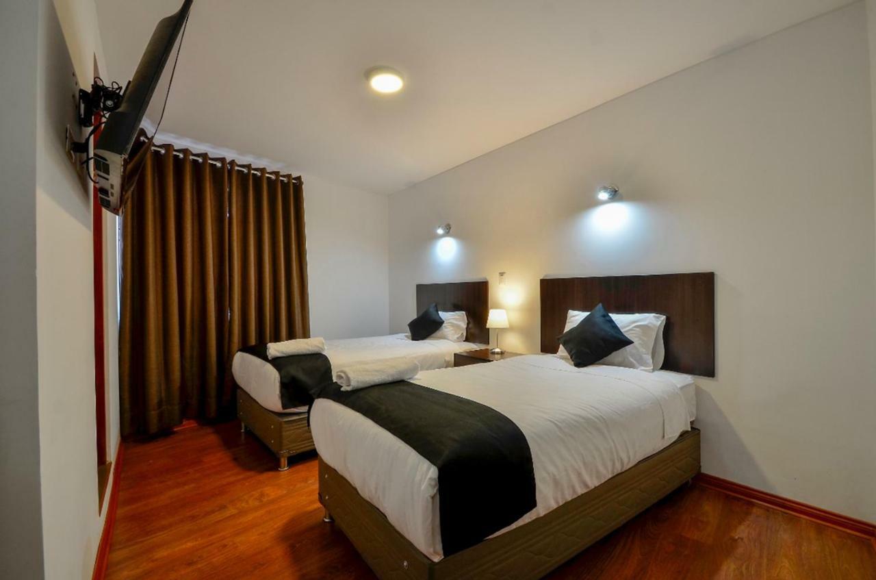 Quarto com 2 Camas de Solteiro